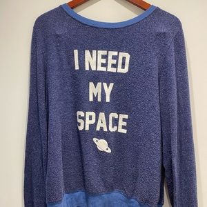 Blue long sleeve graphic top